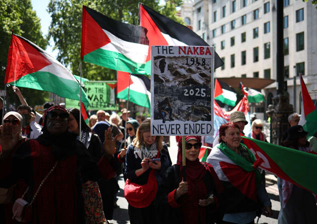 Pro-Palestinian supporters gather on the Embankment ahead of a march through central London,  at a demonstration, calling for a "Free Palestine" and an end to "the Genocide", as they commemorate the 77th anniversary of the Nakba,  May 17, 2025.