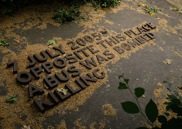 Text reading "7 July 2005 Opposite this Place A Bus Was Bombed Killing" is displayed on the memorial to victims of the London Bombing in Tavistock Square on June 02, 2025 in London; illustrative.