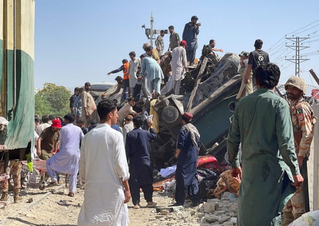 People gather as they search for survivors after a blast near a railway track in Quetta, Pakistan, May 24, 2026. Picture taken with a mobile phone