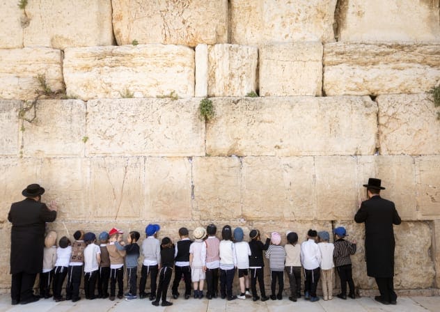 Ultra orthodox Jewish children pray at the Western Wall in Jerusalem's Old City, on April 19, 20226. 