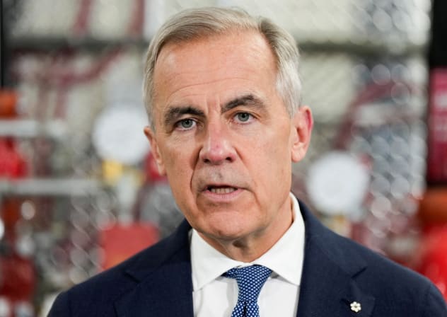 Canada's Prime Minister Mark Carney speaks as he meets unionized skilled trades workers at the United Association of Journeymen and Apprentices of the Plumbing and Pipefitting Industry of the United States and Canada (UA) office in Calgary, Alberta, Canada, May 15, 2026.