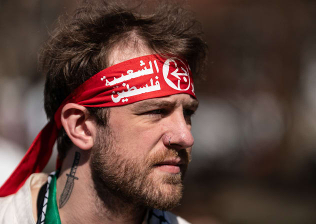 A person wearing the headband of the Popular Front for the Liberation of Palestine (PFLP) attends a march to demand the release of Mahmoud Khalil on March 11, 2025 in New York City.