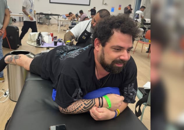 Gal Bilboa-Dalal receives first tattoo from Healing Ink based on the secret message from his brother Guy Bilboa-Dalal carried out of Gaza by a freed hostage. 