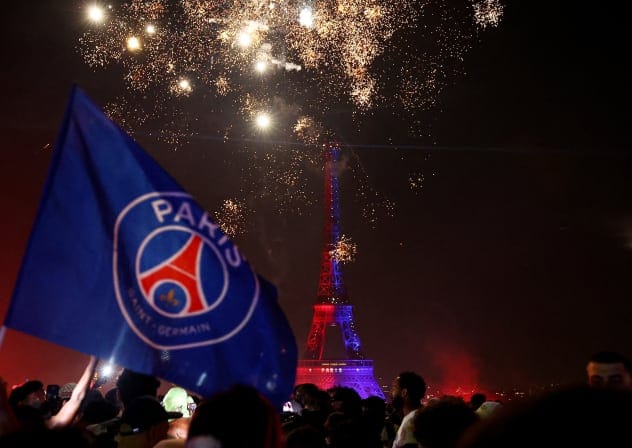 General view of the Eiffel Tower as Paris St Germain fans celebrate after winning the UEFA Champions League.