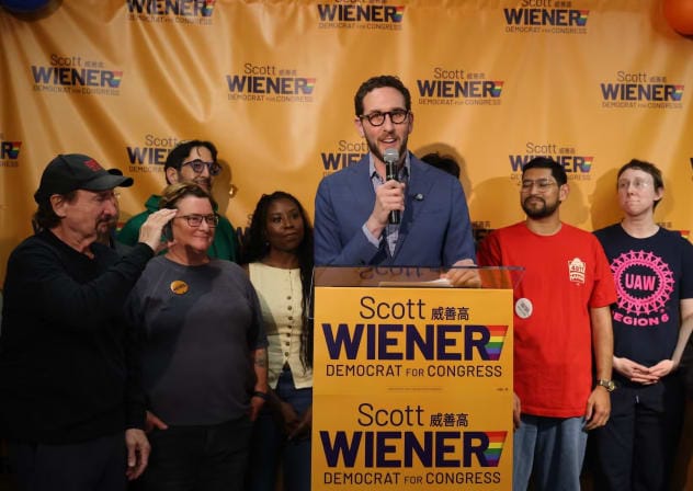 People gather at state Senator Scott Wiener’s election party at his campaign headquarters on election night in San Francisco, Calif. on Tuesday, June 2, 2026.