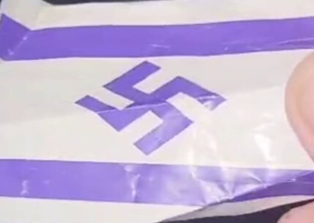 Cards with an Israeli flag with a swastika scattered in and around Justice Solberg's house on June 3, 2026.