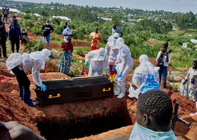 Red Cross workers prepare to lower the coffin of Dr Tibenderana Katho Blaise who worked at the Centre Medical Evangelique (CME) in Hoho commune and died of Ebola virus, at the Nyamurongo cemetery in Bunia town, Ituri province, Democratic Republic of Congo, May 26, 2026. 