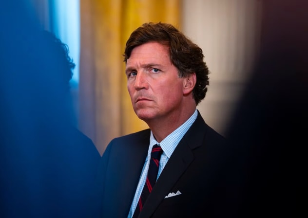 Tucker Carlson attends a meeting with oil executives in the East Room of the White House, Washington DC, Jan. 9, 2026.