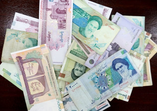 Iranian Rials are displayed in Tehran.