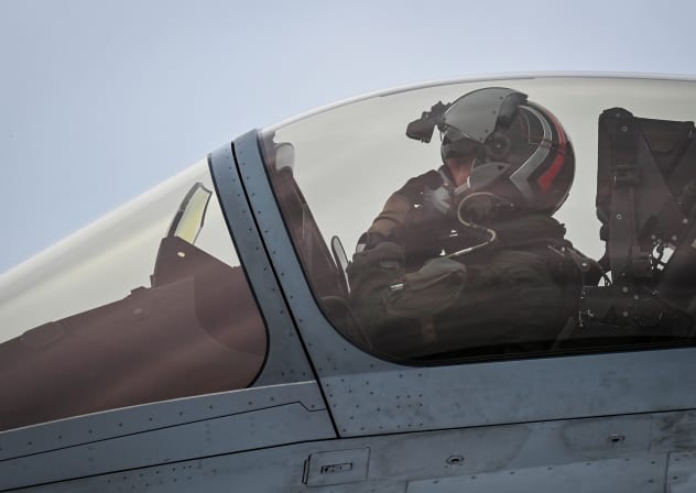 French Air and Space Force Rafale jet pilot sits in a Rafale jet plane at the Air Base 115 in Orange, in southeastern France, on April 28, 2026.