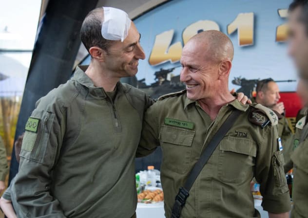 Col. Meir Biderman (L), wounded by a Hezbollah drone attack, embraces IDF Northern Command Chief Maj.-Gen. Rafi Milo (R) at a changeover ceremony, June 7, 2026.