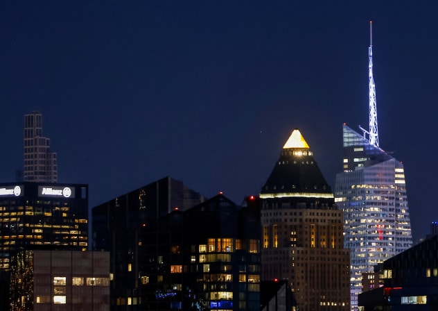 The Bank of America headquarters building in New York City is lit up for the SpaceX initial public offering as it is seen from West New York, New Jersey, U.S., June 4, 2026