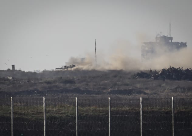 An Israeli tank patrols inside the Gaza Strip, as seen from the Israeli side of the border, June 21, 2026.