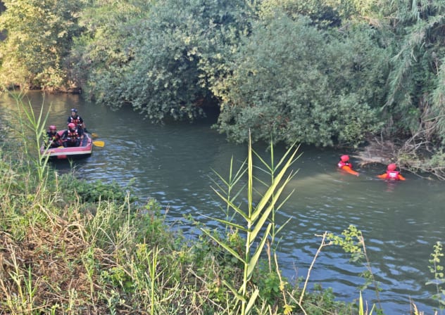 Fire and rescue teams from the Galilee and Golan Heights conducting searches in boats and in the water after two girls were swept into the Jordan River.