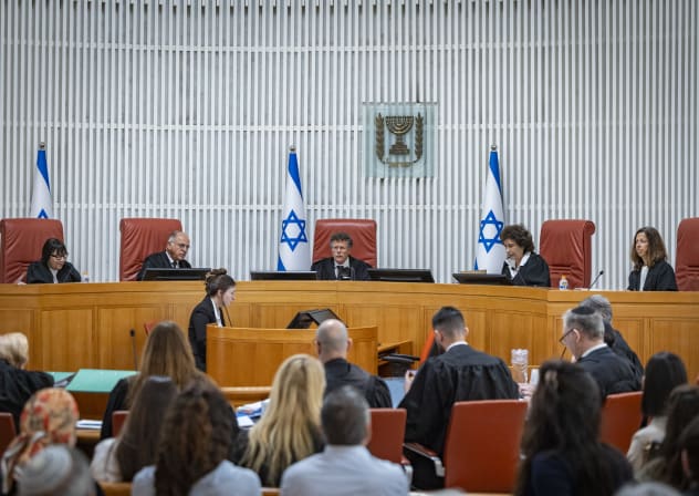 Supreme Court President Isaac Amit and Supreme Court justices arrive for a hearing at the Supreme Court in Jerusalem on petitions seeking to overturn the election of attorney Michael Rabello as State Comptroller, June 28, 2026.