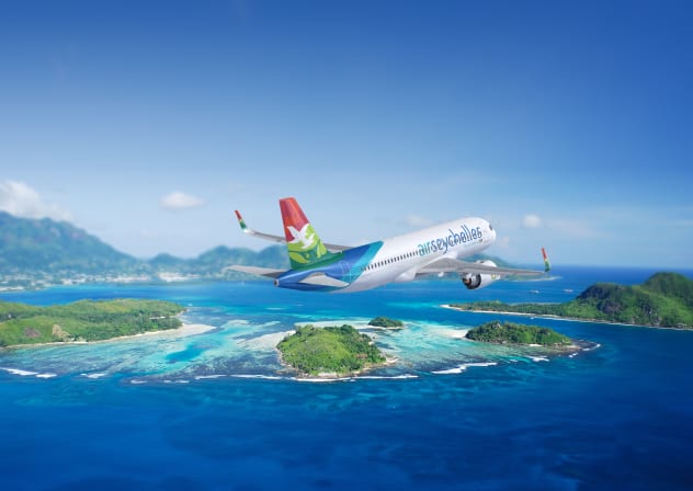 An Air Seychelles Airbus A320, pictured flying over tropical islands; illustrative.