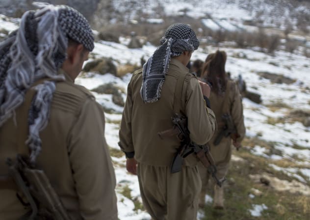 Members of the Kurdistan Democratic Party of Iran (KDPI) participate in a military drill in an outpost near Erbil, Kurdistan region of Iraq on January 15, 2026.