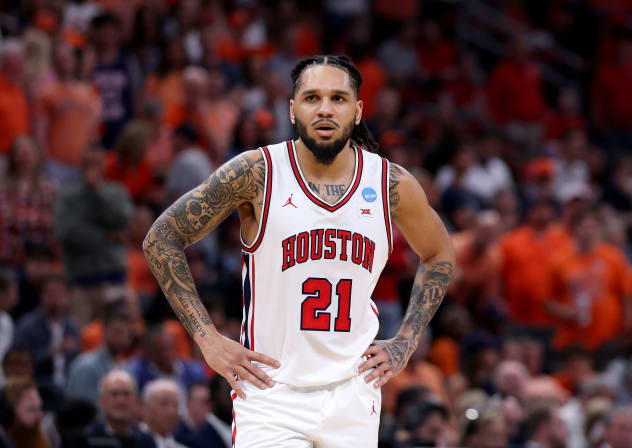 Emanuel Sharp #21 of the Houston Cougars looks on against the Illinois Fighting Illini during the first half in the Sweet Sixteen of the 2026 NCAA Men's Basketball Tournament at Toyota Center on March 26, 2026 in Houston, Texas