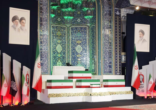 Coffins are displayed containing the late Iranian Supreme Leader, Ayatollah Ali Khamenei, and his family at Imam Khomeini Grand Mosque on July 3, 2026 in Tehran, Iran.