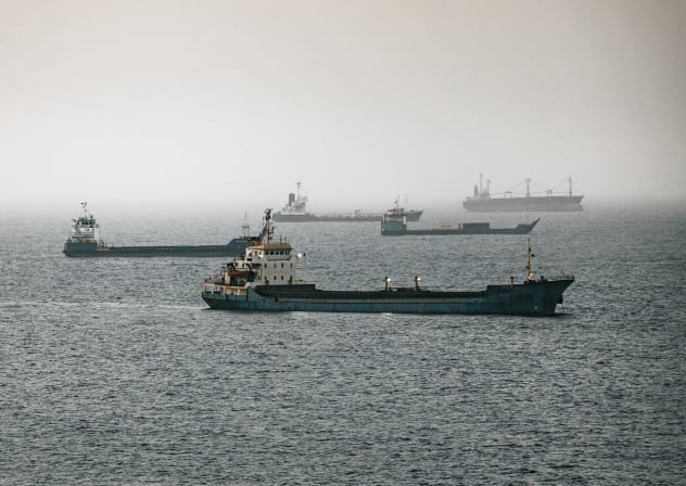  Crude oil tankers, bulk carriers and vessels sit anchored around Qaboos Port on June 22, 2026 in Muscat, Oman.