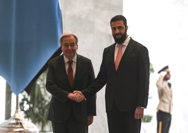 Syria's President Ahmed al-Sharaa (R) receives UN Secretary-General Antonio Guterres at the People's Palace in Damascus on July 25, 2026.