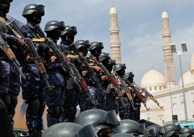 Members of Houthi security force stand guard as Houthi supporters rally against the Saudi-led coalition's restrictions on Houthi-controlled areas, which the group describes as a blockade, in Sanaa, Yemen, July 17, 2026.