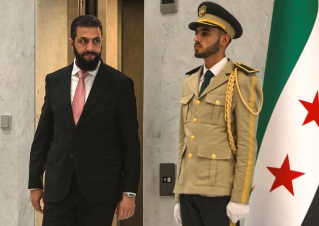 Syria's President Ahmed al-Sharaa (L) arrives to receive UN Secretary-General Antonio Guterres at the People's Palace in Damascus on July 25, 2026