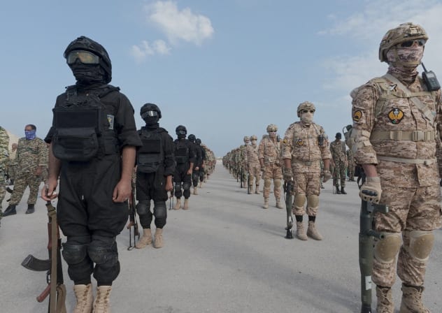 Members of the Islamic Revolutionary Guard Corps (IRGC) attend an exercise in southern Iran, in this handout image obtained on February 16, 2026.