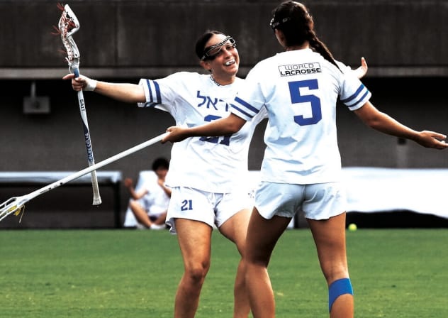 ISRAEL'S PLAYERS celebrate after defeating the Haudenosaunee 7-4 to capture the country’s first-ever medal at the Women’s Field Lacrosse World Championship in Tokyo. 