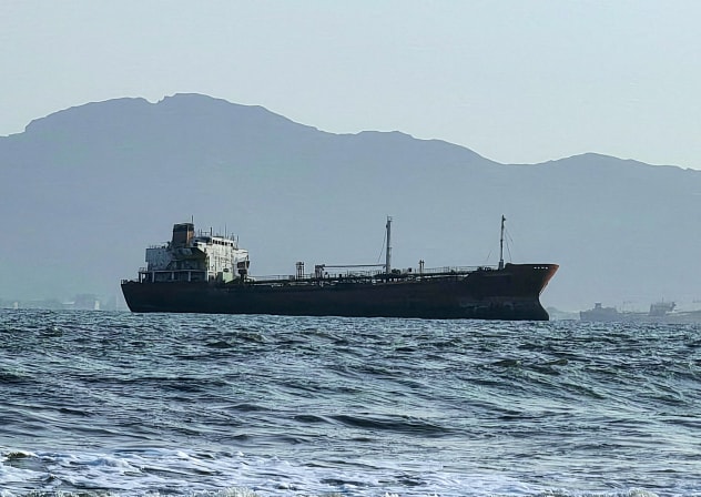 A ship off the port of Aden, where traffic remained steady after the Iran-aligned Houthis said their forces had carried out missile and drone strikes on Saudi oil tankers, in Aden, Yemen, July 23, 2026.