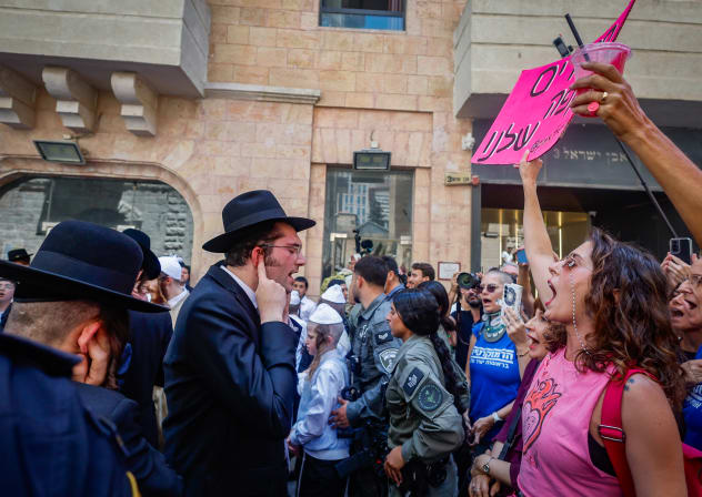 Ultra-Orthodox protesters demonstrate against a cafe operating on Shabbat and clash with Israeli police, while secular protesters hold a counter-demonstration in support of the cafe in central Jerusalem, August 8, 2026. 