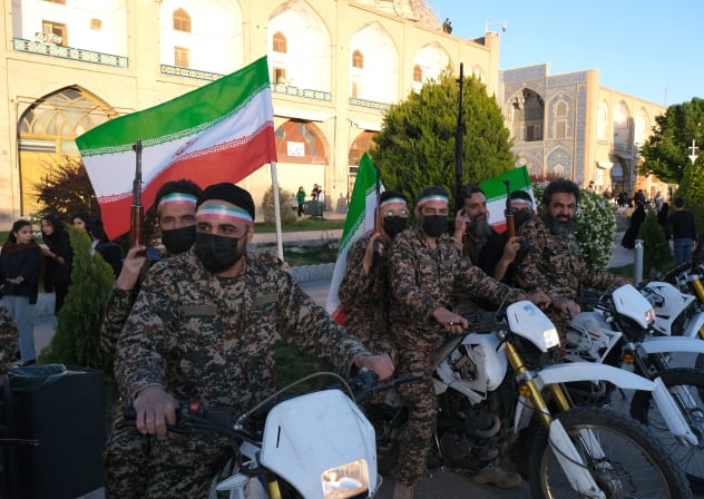 A group of Basiji paramilitary men in military fatigue and armed seen in the middle of Naqsh-e Jahan Square mounted on their motorcycles in Isfahan, Iran, April 29, 2026.