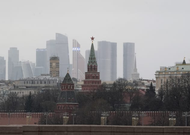 This photograph taken on February 13, 2025 shows the view of the Kremlin's towers with Moscow's International Business Centre (Moskva City) in the background in Moscow. 