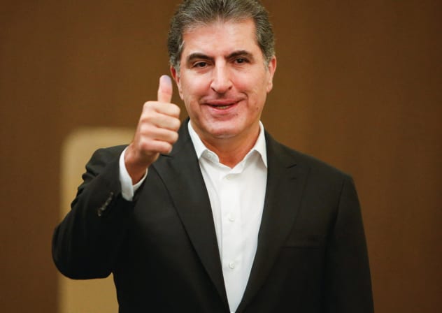 Kurdistan Region President Nechirvan Barzani gestures on the day he votes during the parliamentary election in Erbil, Iraq, November 11, 2025.