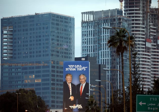 A Likud election campaign billboard, depicting US President Donald Trump shaking hands with Israeli Prime Minister Benjamin Netanyahu, is seen at a main entrance to Tel Aviv, Israel, February 5, 2019.