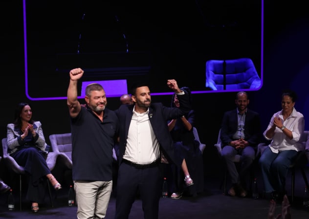 Ofer Winter takes the stage alongside activist Yoseph Haddad during Winter's during his party announcement event on August 25, 2026. 