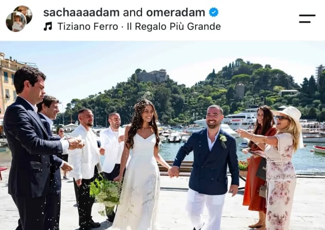 Newlyweds Omer Adam and Sacha Israelovich post an image of their intimate wedding ceremony in Portofino, August 25, 2026. 