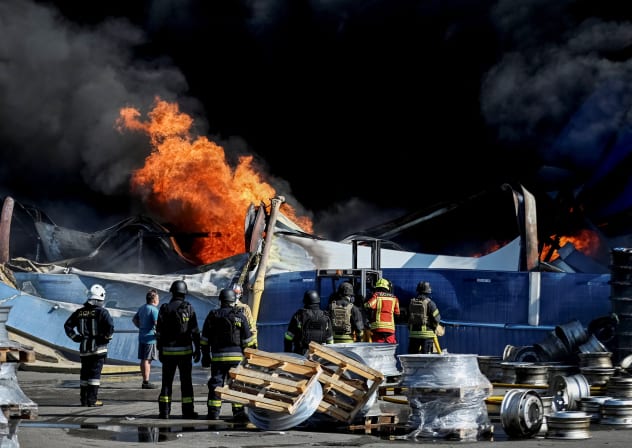 Firefighters work at a site of a Russian drone strike, amid Russia's attack on Ukraine, in Kyiv, Ukraine August 29, 2026.