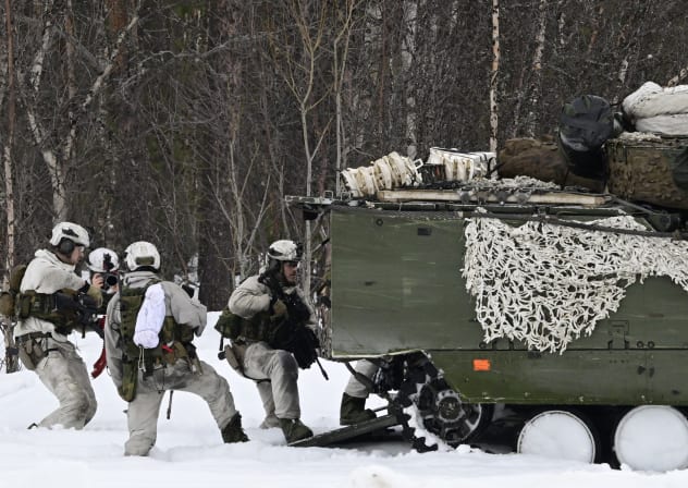 Norwegian troops attend a military demonstration at the Bardufoss Airbase in Norway on March 13, 2026.