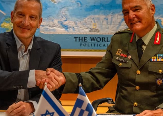 Maj. Gen. Amir Baram, director-general of Israel's Defense Ministry, and  Maj. Gen. Ioannis Bouras of Greece sign major defense export arms deal between their two countries.