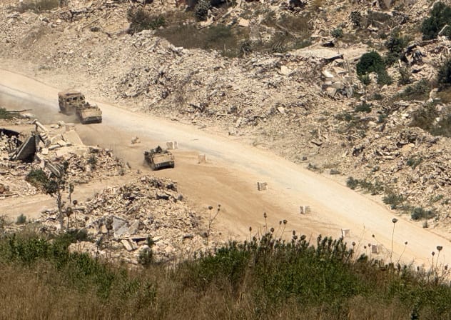 Israeli vehicles drive on a road in southern Lebanon, as seen from the Israeli side of the Israel-Lebanon border, in northern Israel, August 6, 2026. Picture taken with a mobile phone. 