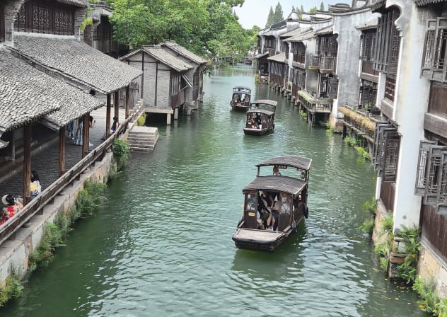 ONCE A poverty-stricken farming community, Wuzhen is now a must for visitors to Zhejiang province.
