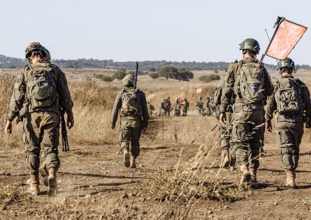 Israeli soldiers from the Netzah Yehuda Battalion take part in a military training exercise near the Israeli border with Lebanon, northern Israel, August 20, 2026. 