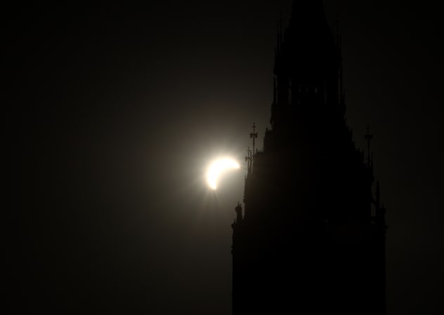 The Elizabeth Tower more commonly known as Big Ben is pictured during a near total solar eclipse, with more than 90 percent of the Sun blocked by the Moon across Britain, in central London on August 12, 2026.