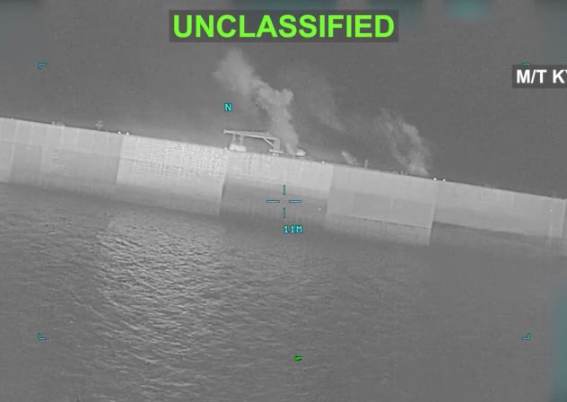 Fire and smoke rise from what US Central Command (CENTCOM) says shows M/T Kylo in a location given as the Gulf of Oman during strikes on Iranian oil carriers, in this screengrab taken from a handout video released on September 5, 2026. 