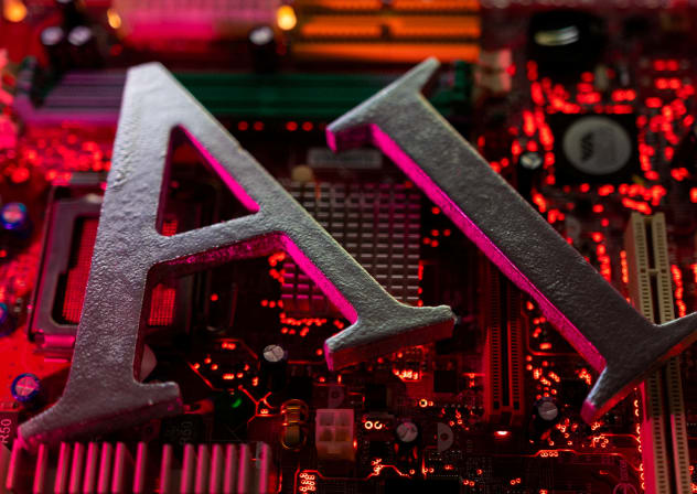 AI (Artificial Intelligence) letters are placed on computer motherboard in this illustration taken, June 23, 2023