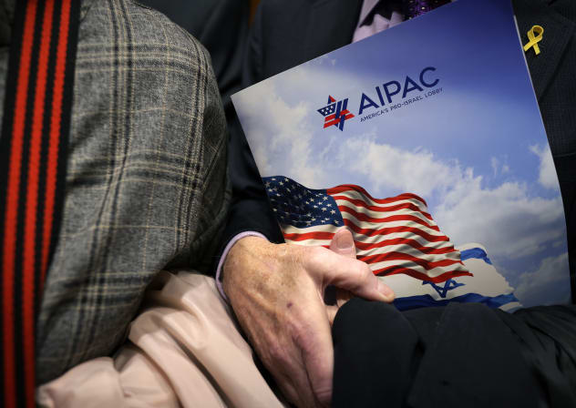 A visitor holds an AIPAC folder in an elevator in Rayburn House Office Building on March 12, 2024 on Capitol Hill in Washington, DC; Illustrative.