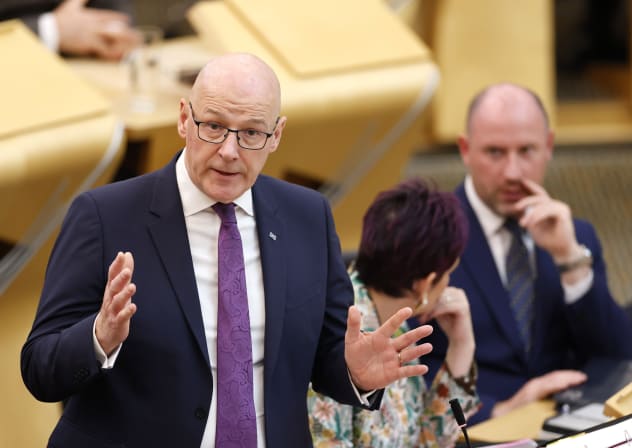 Scottish First Minister John Swinney (L) delivers a statement on the 2026 Programme for Government at Scottish Parliament on September 1, 2026 in Edinburgh, Scotland.