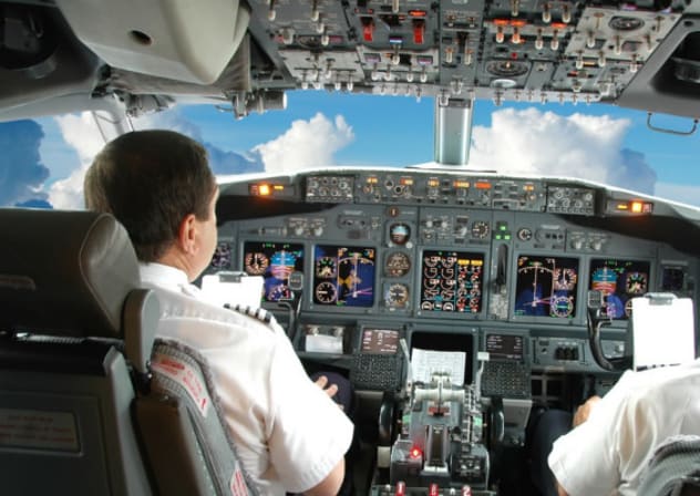 Female Pilot in the Cockpit.