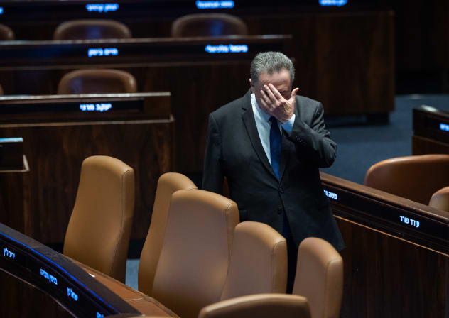 Defense Minister Israel Katz attends a plenum session and a vote on a bill to split the duties and powers currently held by the attorney general between two separate officeholders, at the assembly hall of the Knesset, the Israeli parliament in Jerusalem, July 15, 2026. 